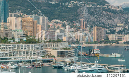 Monte Carlo city aerial panorama timelapse. View of luxury yachts and buildings in harbor of Monaco, Cote d'Azur. 132297161