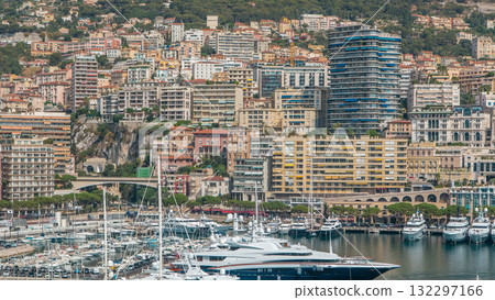 Monte Carlo city aerial panorama timelapse. View of luxury yachts and apartments in harbor of Monaco, Cote d'Azur. Monte Carlo city aerial panorama timelapse. View of luxury yachts and apartments in harbor of Monaco, Cote d'Azur. 132297166