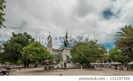 Aerial drone view of people relaxing at Dom Luis Garden in the Baixa District of Lisbon, Portugal on a warm spring day with surrounding urban cityscape in the background Aerial drone view of people relaxing at Dom Luis Garden in the Baixa District of Lisbon, Portugal on a warm spring day with surrounding urban cityscape in the background 132297309