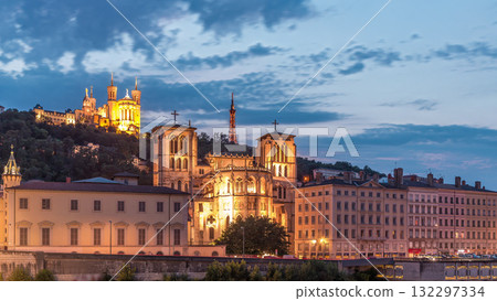 Timelapse of Saint John the Baptist Cathedral and Basilica of Notre-Dame de Fourviere in Lyon, from day to night. France 132297334