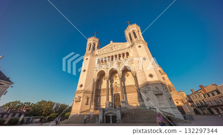 Hyperlapse front view of the Basilica of Notre Dame de Fourviere during sunset in Lyon, France. Hyperlapse front view of the Basilica of Notre Dame de Fourviere during sunset in Lyon, France. 132297344
