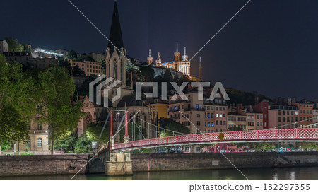 Timelapse hyperlapse of Saint George Church at night, Quais de Saone and Fourviere Basilica from a footbridge in Vieux Lyon, France 132297355