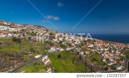Aerial view from the mountain over the rooftops from cable car on Madeira timelapse hyperlapse. 132297357