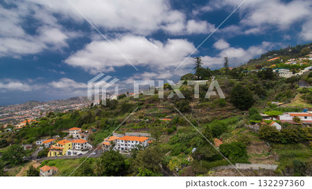 View from the mountain over the rooftops from cable car on Madeira timelapse hyperlapse. 132297360