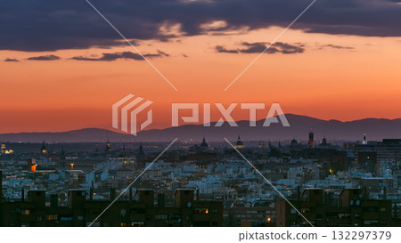 Panoramic day to night timelapse view of Madrid, Spain. Photo taken from the hills of Tio Pio Park, Vallecas-Neighborhood. 132297379