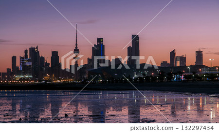 Seaside skyline of Kuwait city from night to day timelapse 132297434
