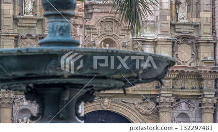 Statue on The Basilica Cathedral of Lima is a Roman Catholic cathedral located in the Plaza Mayor timelapse hyperlapse in Lima, Peru 132297481