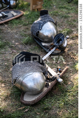 The knight's iron armor lies on the ground 132298188