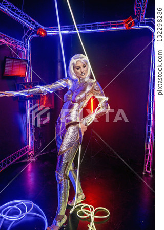 blonde girl as cyber robot. cyber girl in shining silver armor in neon 132298286