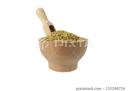 dried flowers of black lilac or black elder in latin sambuci flos in wooden bowl and scoop isolated on white background. Medicinal herb. 132298724