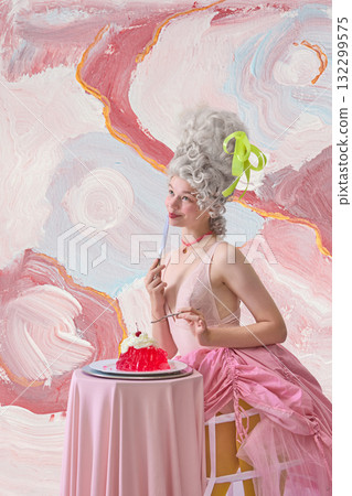 Rococo woman in pink dress admiring red dessert with dreamy cinematic gaze Rococo woman in pink dress admiring red dessert with dreamy cinematic gaze 132299575