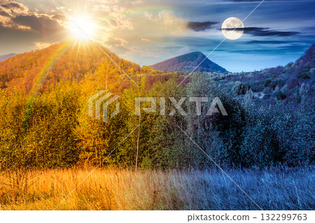 mountain landscape with forest on autumn equinox. day and night time change concept. nature park with birch trees in colorful foliage with sun and moon at twilight. horizontal astrology background 132299763