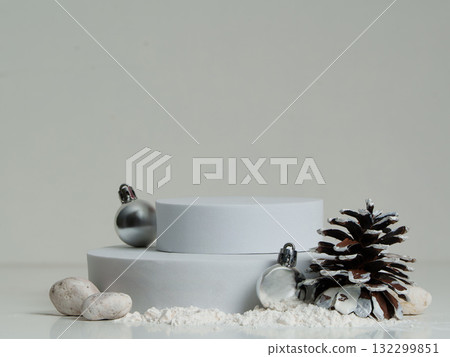 Elegant Christmas background with white podium and natural winter elements. 132299851