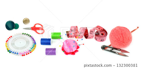 Vibrant Sewing and Knitting Supplies Isolated on White Vibrant Sewing and Knitting Supplies Isolated on White 132300381