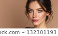 Woman displays mesmerizing green eyes and subtle makeup capturing attention with her serene expression 132301193