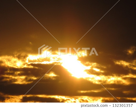 Clouds illuminated by the setting sun Clouds illuminated by the setting sun 132301357