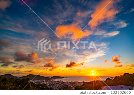 Beautiful sunset or sunrise over the sea with colorful clouds,Amazing clouds and majestic light nature background Beautiful sunset or sunrise over the sea with colorful clouds,Amazing clouds and majestic light nature background 132302600
