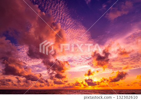 Beautiful sunset or sunrise over the sea with colorful clouds,Amazing clouds and majestic light nature background Beautiful sunset or sunrise over the sea with colorful clouds,Amazing clouds and majestic light nature background 132302610
