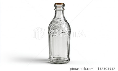 Empty vintage glass bottle with embossed design and metal cap on white background, clear transparent container for beverages and liquids Empty vintage glass bottle with embossed design and metal cap on white background, clear transparent container for beverages and liquids 132303542