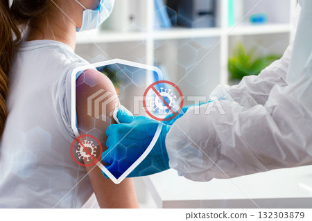 Health professional administers vaccine to patient in medical clinic setting Health professional administers vaccine to patient in medical clinic setting 132303879