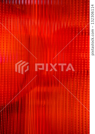 Close-up of the red semi transparent glass wall with the shape of traditional Chinese lantern. For background use. Close-up of the red semi transparent glass wall with the shape of traditional Chinese lantern. For background use. 132306114