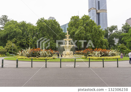 Melbourne, Australia - January 3, 2024 : The Carlton Gardens fountain at Royal Exhibition Building in Melbourne, Australia - January 3, 2024. Melbourne, Australia - January 3, 2024 : The Carlton Gardens fountain at Royal Exhibition Building in Melbourne, Australia - January 3, 2024. 132306238