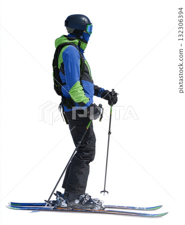 Skiing athlete stands poised on the slope in bright winter gear, ready for action in a snowy mountain landscape under clear skies Skiing athlete stands poised on the slope in bright winter gear, ready for action in a snowy mountain landscape under clear skies 132306394