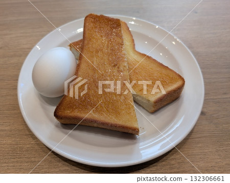 Buttered toast and boiled egg Buttered toast and boiled egg 132306661