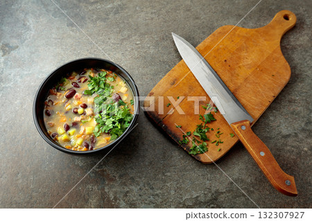 Red bean soup with potatoes, tomatoes, paprika, carrot, and bacon. 132307927