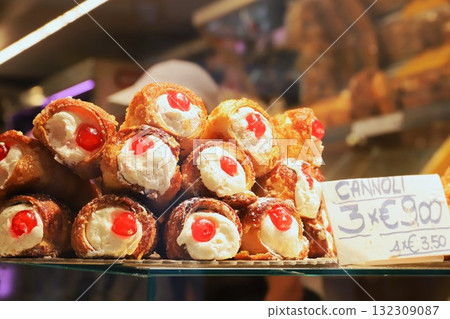 Cannoli, a traditional sweet found in a shop window on the main island of Venice Cannoli, a traditional sweet found in a shop window on the main island of Venice 132309087
