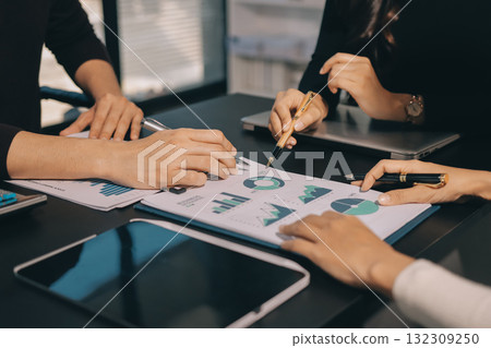 Accounting company provide finance and taxation planning for profitable cash flow, Auditor and accountant team working in office, analyze financial data and accounting record with calculator.Insight 132309250