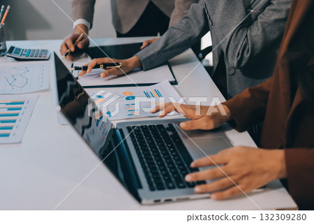 Accounting company provide finance and taxation planning for profitable cash flow, Auditor and accountant team working in office, analyze financial data and accounting record with calculator.Insight Accounting company provide finance and taxation planning for profitable cash flow, Auditor and accountant team working in office, analyze financial data and accounting record with calculator.Insight 132309280