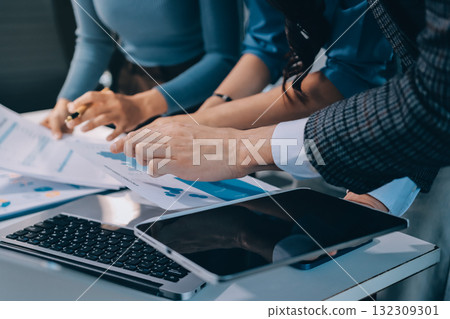 Accounting company provide finance and taxation planning for profitable cash flow, Auditor and accountant team working in office, analyze financial data and accounting record with calculator.Insight Accounting company provide finance and taxation planning for profitable cash flow, Auditor and accountant team working in office, analyze financial data and accounting record with calculator.Insight 132309301