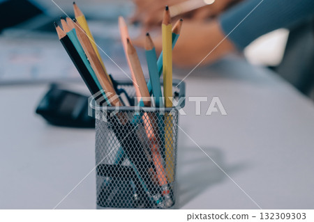 Accounting company provide finance and taxation planning for profitable cash flow, Auditor and accountant team working in office, analyze financial data and accounting record with calculator.Insight 132309303