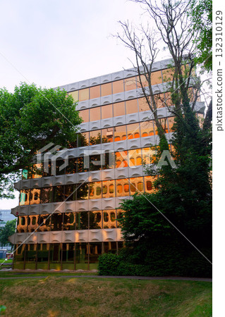 Facade of prefabricated modular concrete on functionalist office for Generali from 1976 opposite the CBR Building, Watermael-Boitsfort, Brussels, Belgium 132310129