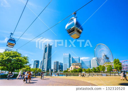 Yokohama cityscape in Japan...View of the ropeway and Yokohama Landmark Tower from Canal Park Station and Canal Park Yokohama cityscape in Japan...View of the ropeway and Yokohama Landmark Tower from Canal Park Station and Canal Park 132310520