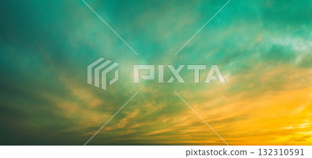 Cloudy sky at sunset. Cloudy sky background. Horizontal banner 132310591