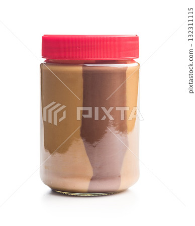 Two-tone nut chocolate spread in jar isolated on white background. 132311115