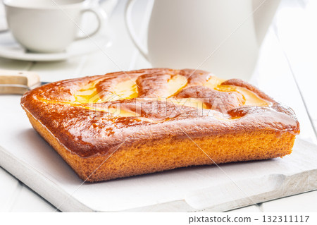 Catalana sponge cake on white table. Catalana sponge cake on white table. 132311117