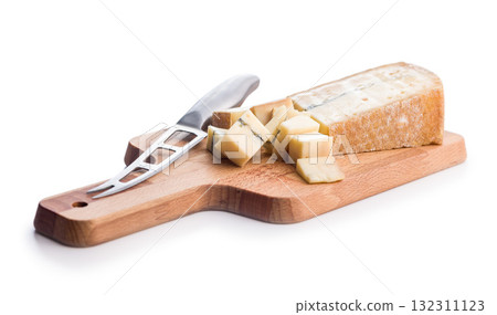 Morbier cheese. Delicious french cheese with mold isolated on white background. Morbier cheese. Delicious french cheese with mold isolated on white background. 132311123