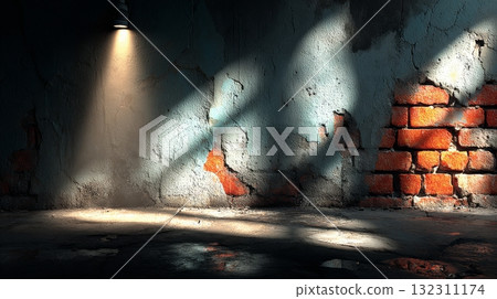 Old wall grunge texture with exposed red bricks and dramatic spotlight. 132311174