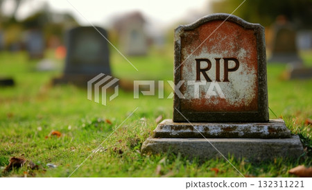 Old Gravestone with RIP Inscription in Sunlight Old Gravestone with RIP Inscription in Sunlight 132311221