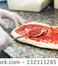 Pizza preparation 132311285