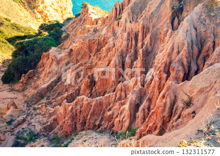 Rocky seascape in the Algarve region in the Atlantic Ocean, Portugal, Europe 132311577