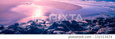 Rocky beach at sunset. Natural background. Horizontal banner 132311678