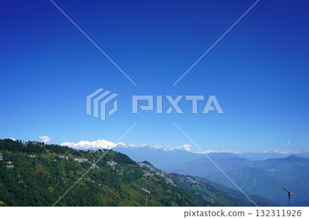 Clear Blue Sky Above Darjeeling Town and Snow Capped Kanchenjunga 132311926