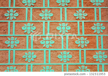 Grunge clay surface with painted floral pattern 132311953