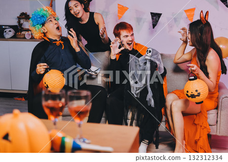 Joyful office Halloween party with coworkers in costumes, celebrating with drinks and laughter, fostering teamwork and festive spirit 132312334