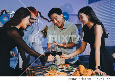 Diversity, dinner and group of people toast celebration together at party. Friends, happy and celebrate with food, wine and friendship for love, support and cheers champagne at business function Diversity, dinner and group of people toast celebration together at party. Friends, happy and celebrate with food, wine and friendship for love, support and cheers champagne at business function 132312368