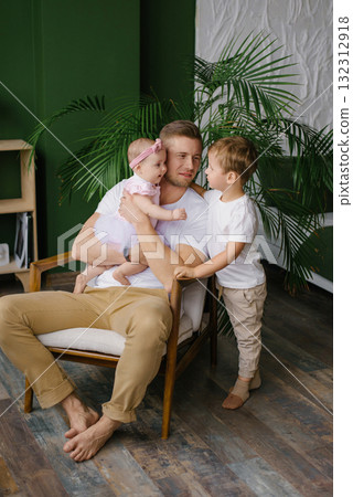 Happy Father With Baby Daughter And Young Son 132312918